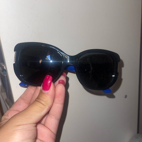Three Burberry and one Versace sunglasses